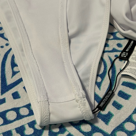 PrettyLittleThing White Asymmetrical Cut-Out One-Piece Swimsuit - Picture 5 of 5